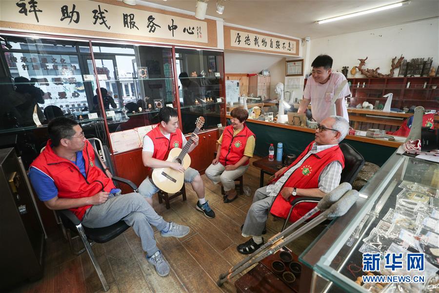 /ueditor/image/2019/07/17/117c3a0902d98871991b08b2e7385135.jpeg 残障青年的助残梦想3.jpeg